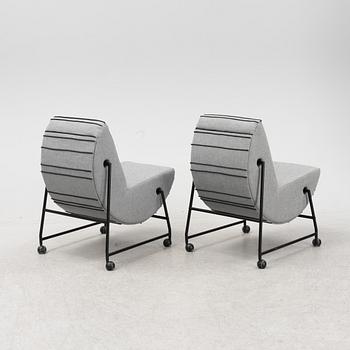 A pair of lounge chairs, 21st century.