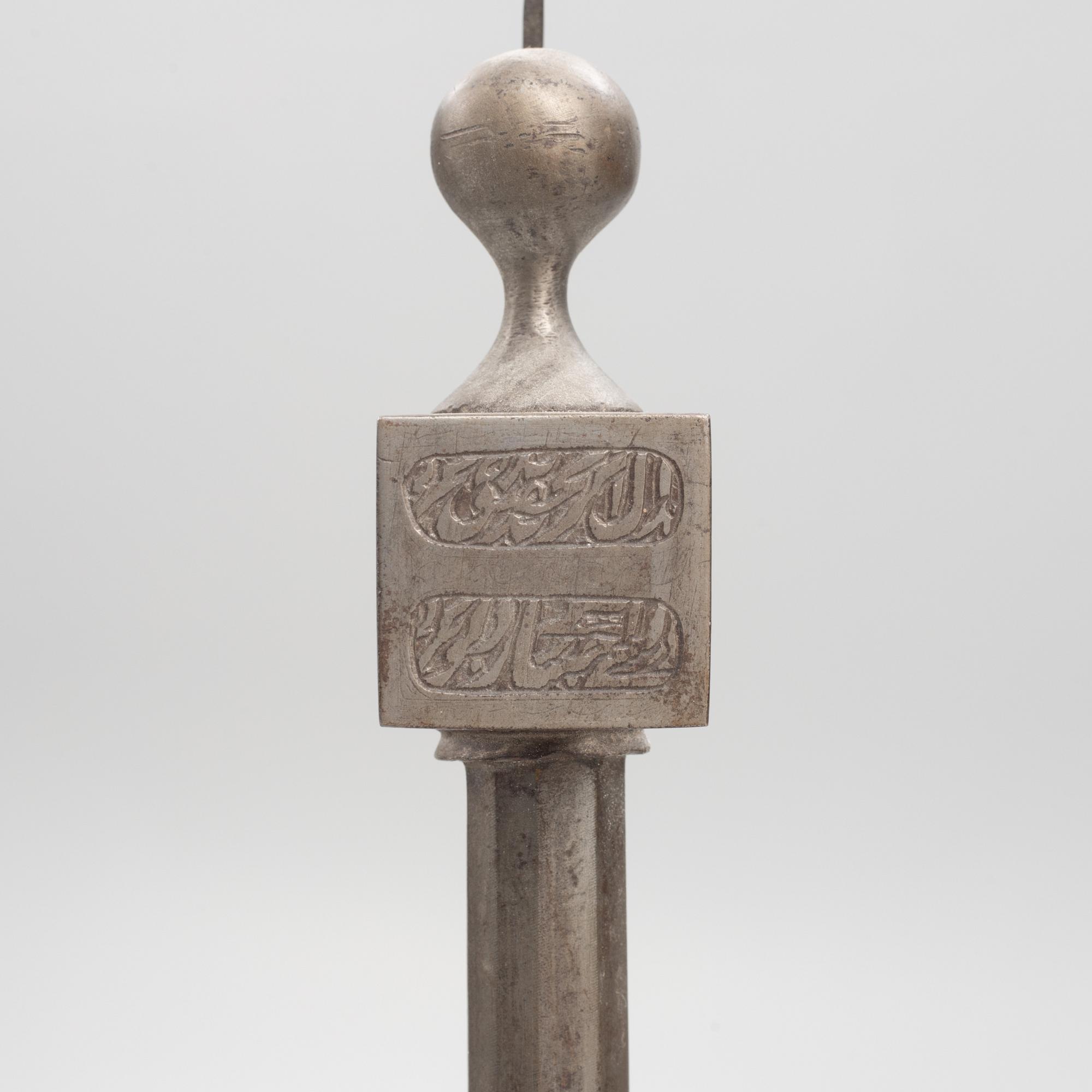 An Indian axe, 19th /20th century.