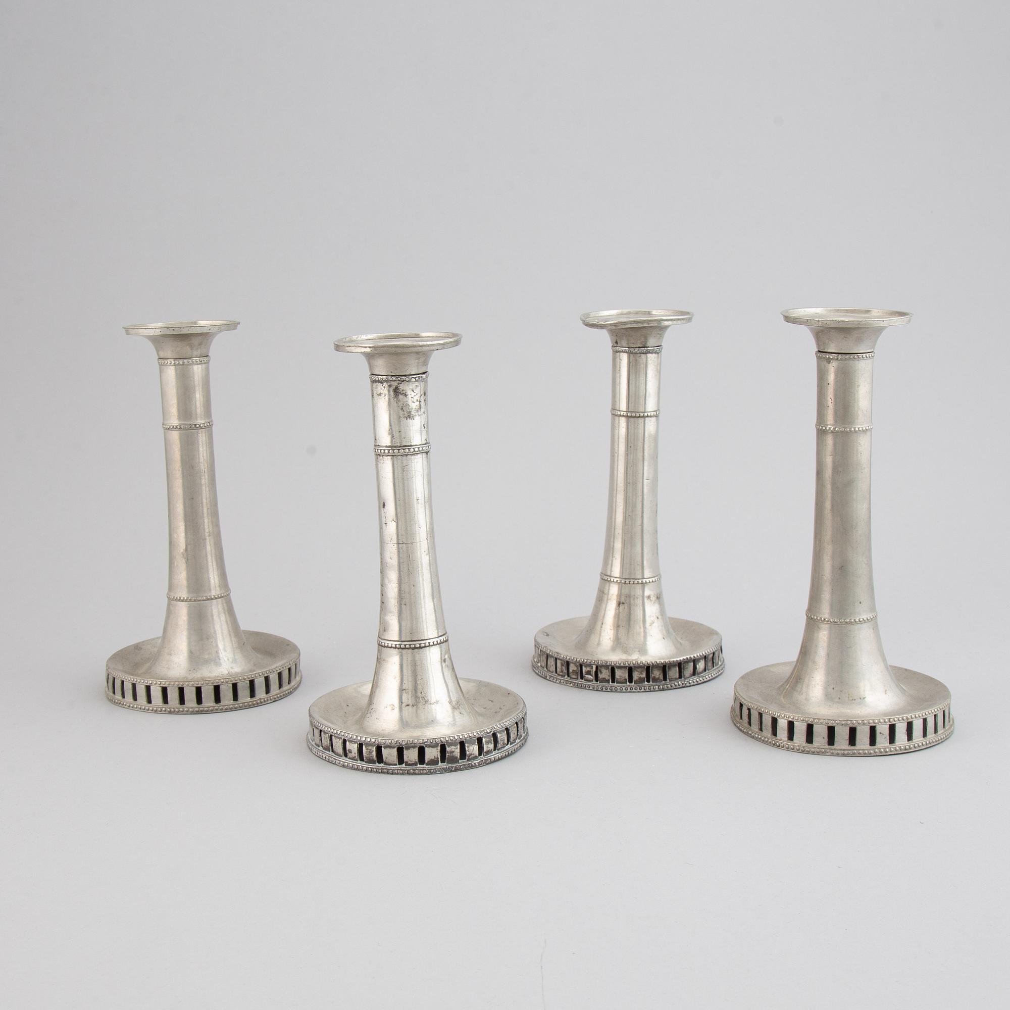 Four Swedish late gustavian pewter candlesticks by Hans Wicksten, Västerås, 1782-1810/14.