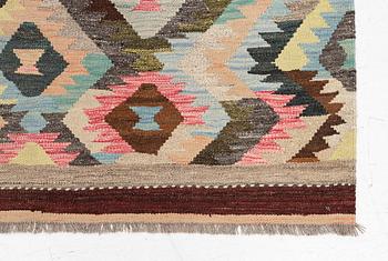 A Kelim carpet, c. 240 x 178 cm.