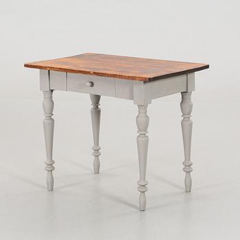 A TABLE WITH DRAW FROM CA 1900.