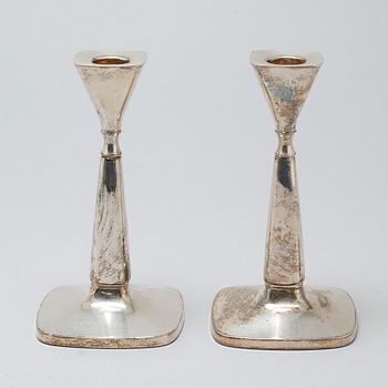 A pair of candlesticks by Thore Eldh for K&EC in Göteborg, 1960s.