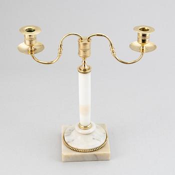 A late Gustavian brass and marble candelabra/candle holder, around the year 1800.