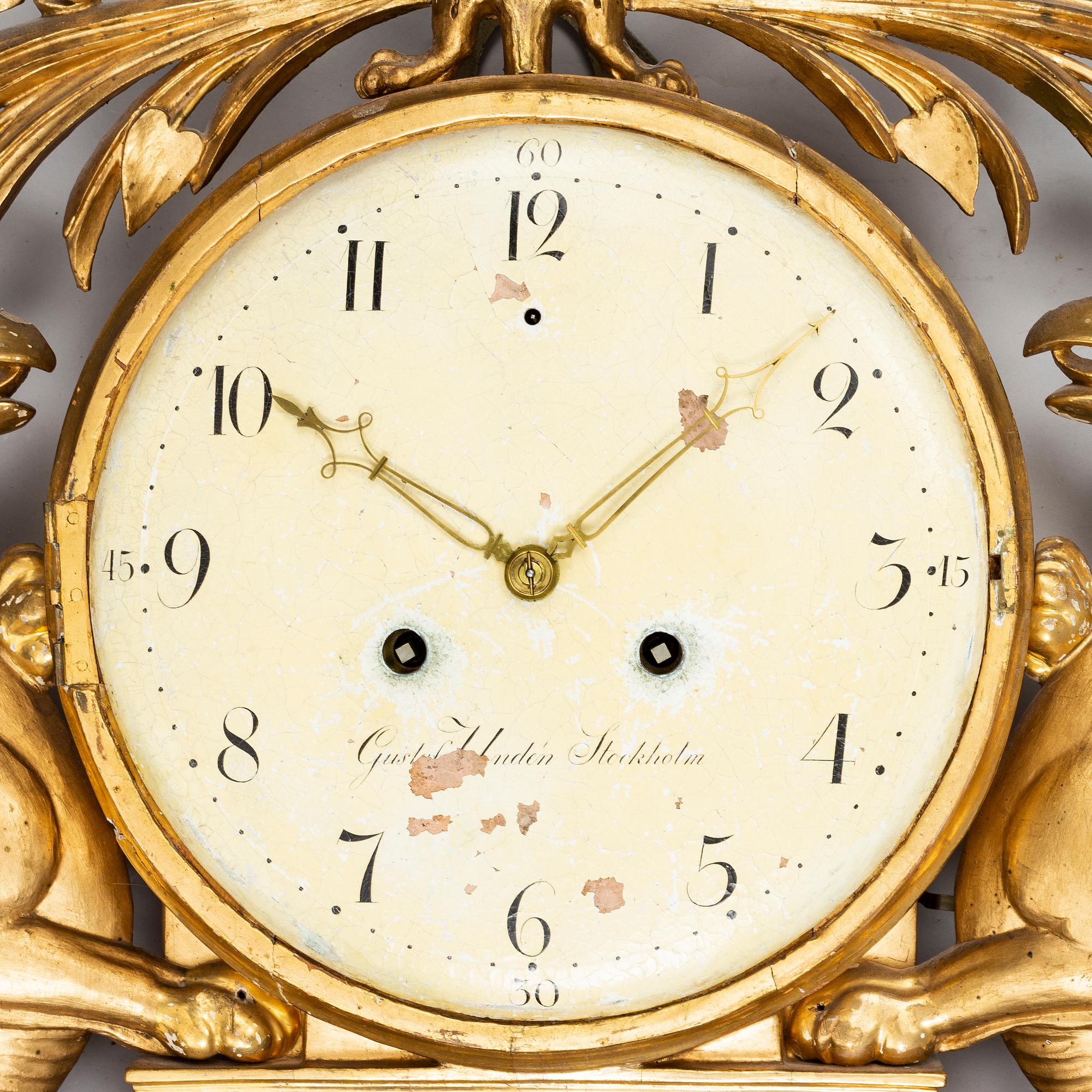 A Swedish Empire wall clock by G Undén (Stockholm 1800-1829).