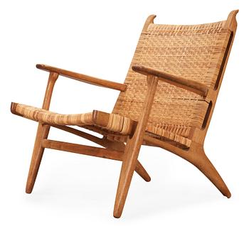 59. A Hans J Wegner 'CH-27' oak and rattan armchair, Carl Hansen & Son, Denmark 1950's-60's.