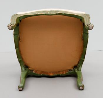 A Rococo 18th century armchair.