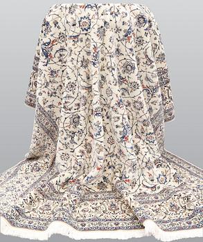 A carpet, Nain Part Silk, S.K 6LAA, ca 350 x 255 cm.