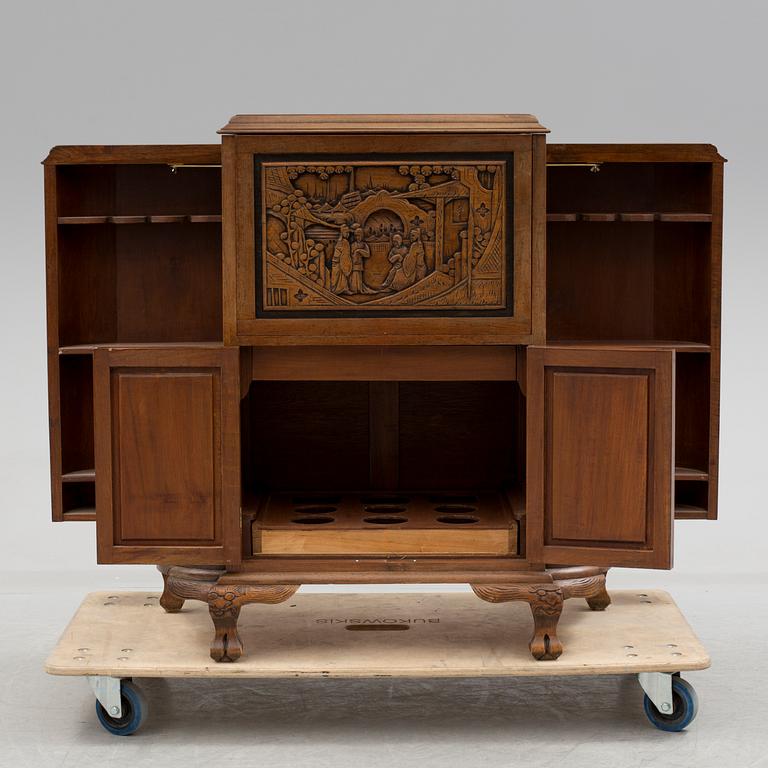 a chinese style bar cabinet from the late 20th century.