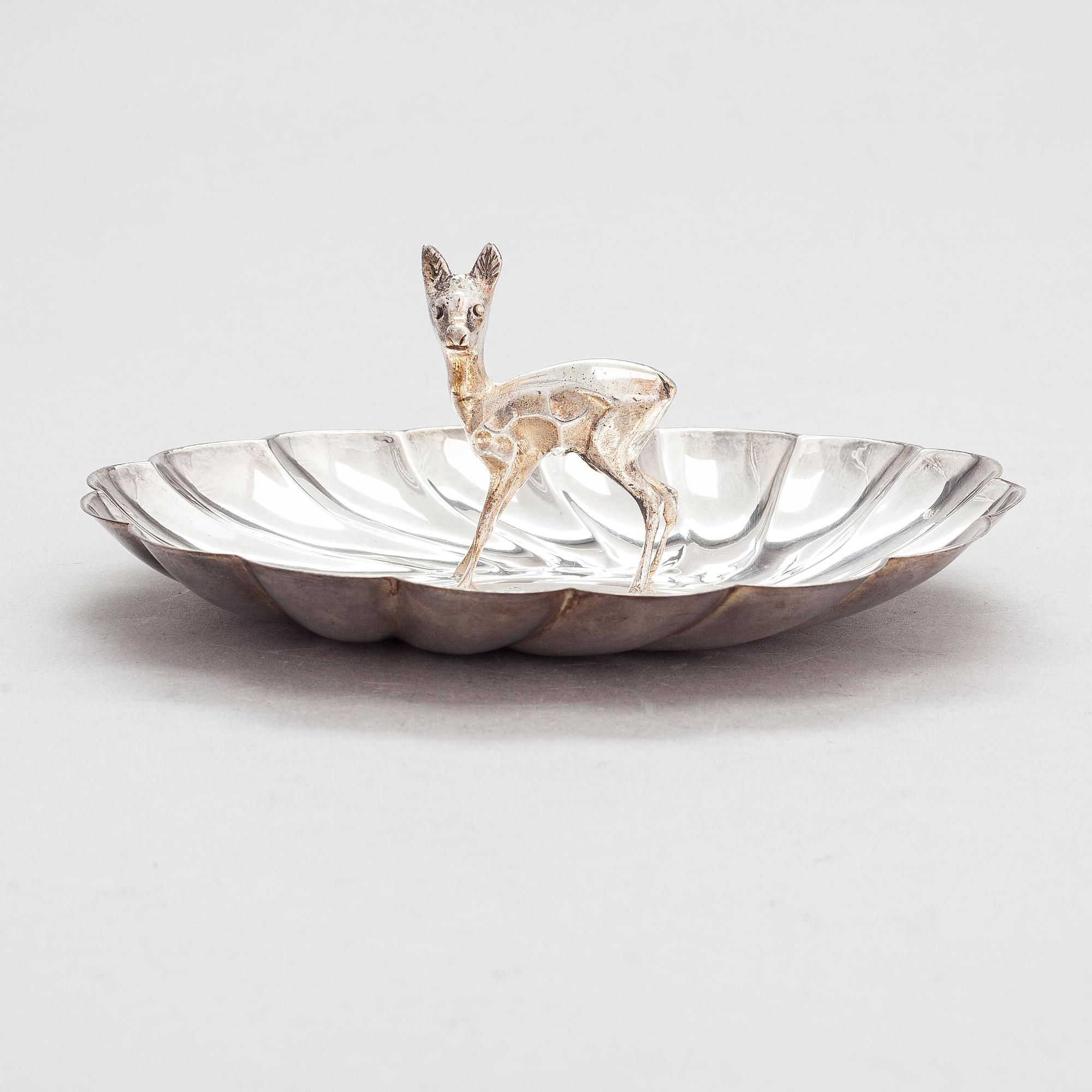 A scalloped silver dish, Pasgorcy, Madrid, Spain, after 1934.