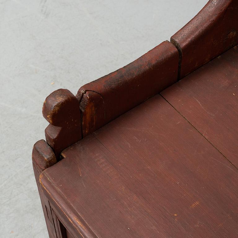 A 19th century painted wood sofa.