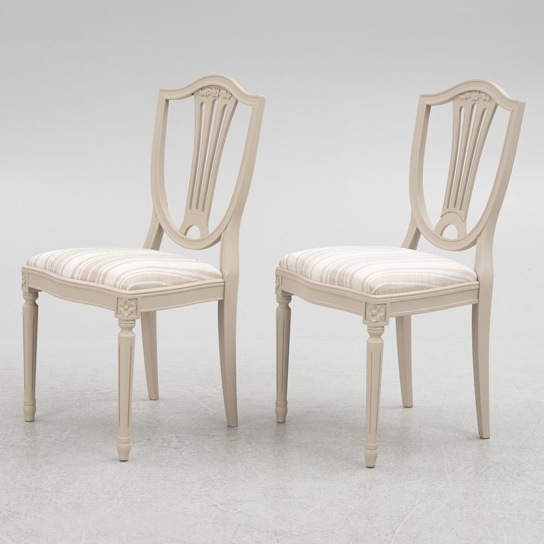 A Gustavian Style Dining Table and 10 Chairs, second half of the 20th Century.