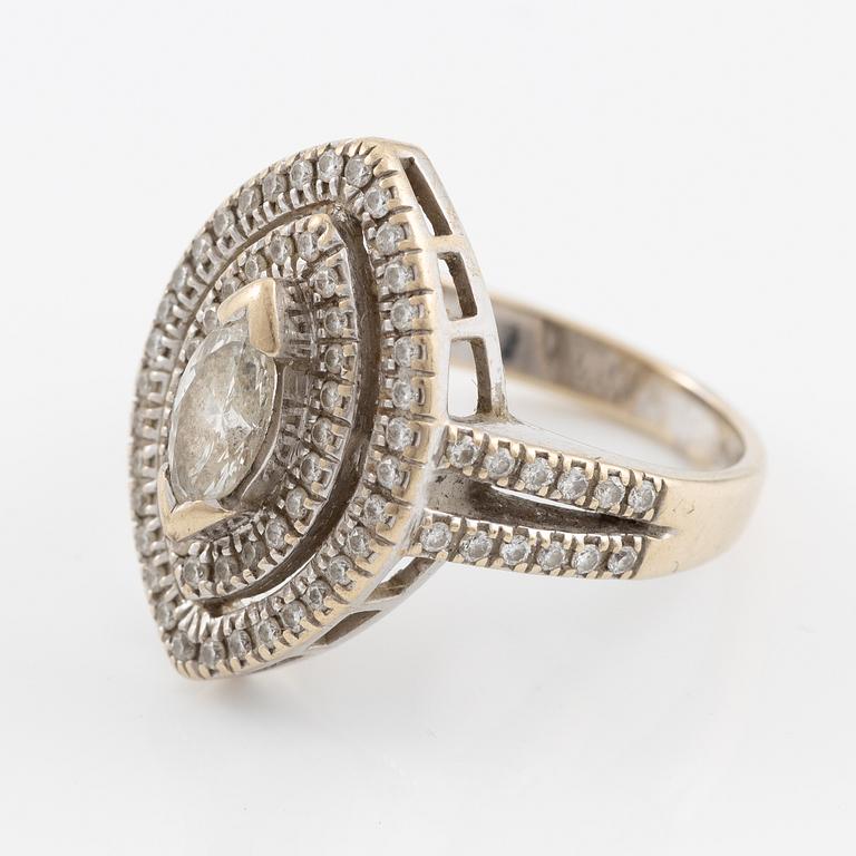 Ring, 18K white gold with a marquise-cut diamond and brilliant-cut diamonds.