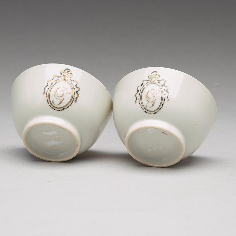 A pair of armorial grisaille cups, Qing dynasty, Qianlong (1736-95).