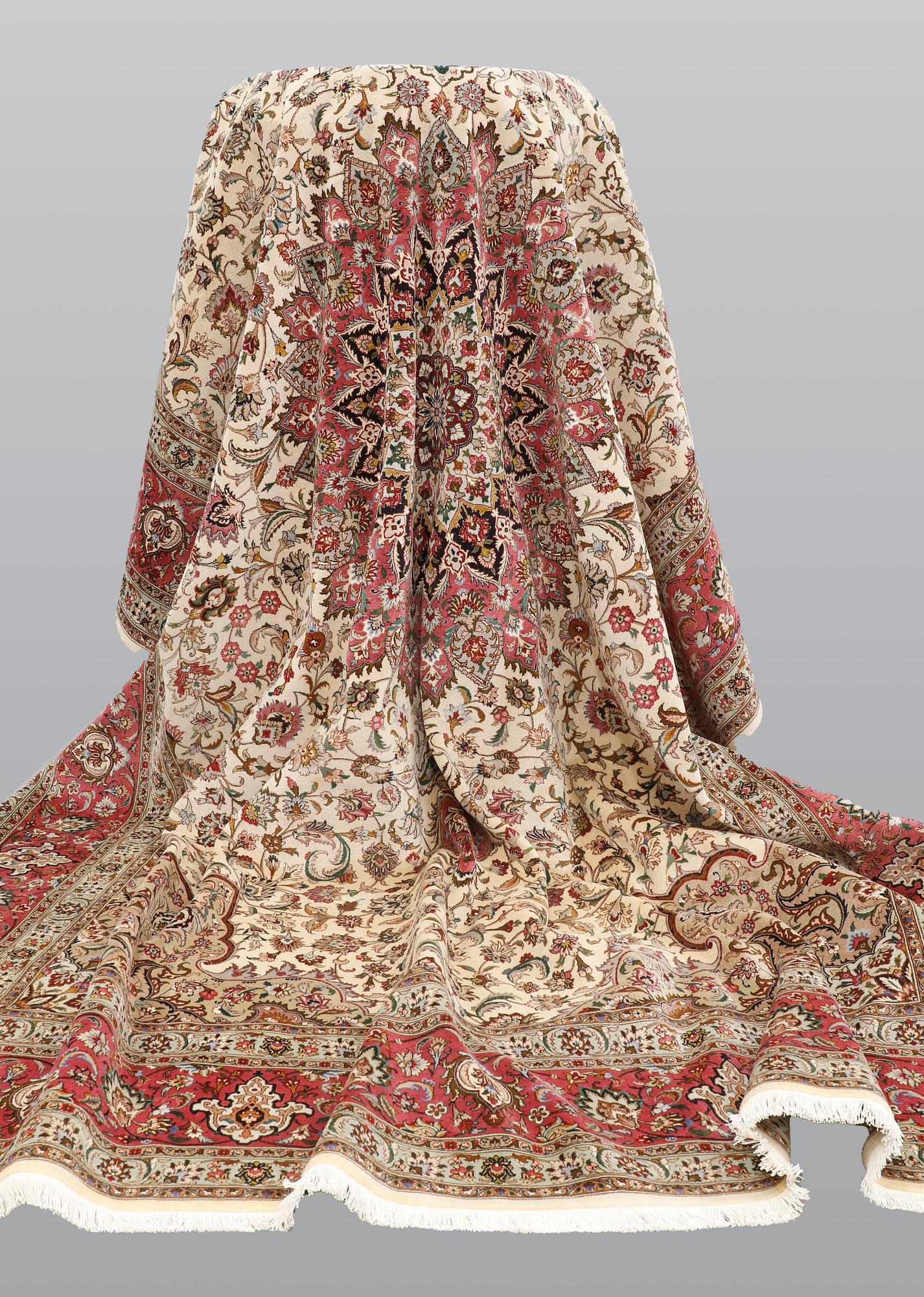 A carpet, Tabriz part silk, so called 50 Raj, cm 400 x 300 cm.