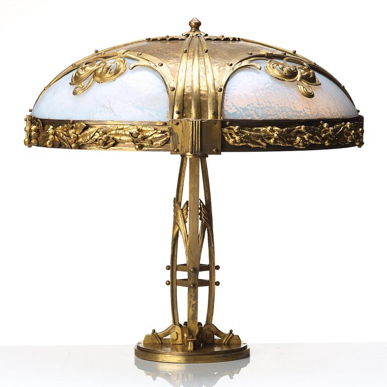 An Art Nouveau bronze table lamp, early 20th century.