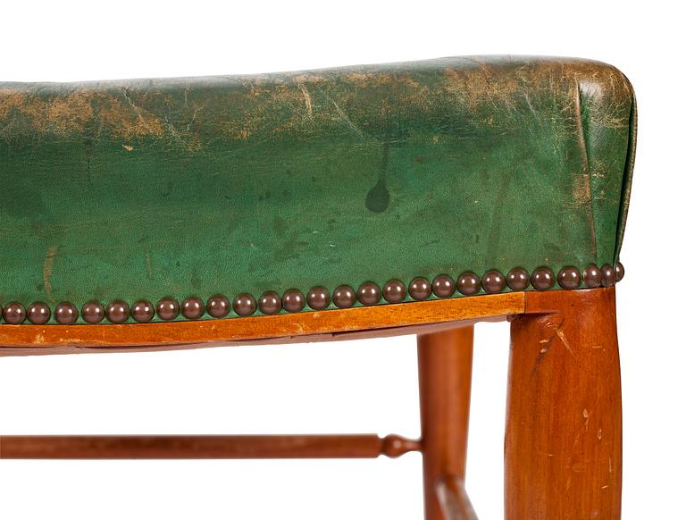 A Josef Frank green leather and mahogany stool, Svenskt Tenn.
