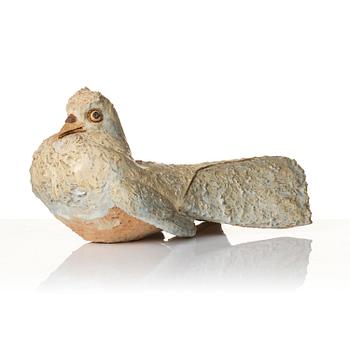 Tyra Lundgren, a chamotte stoneware sculpture of a bird, executed in her studio, Bredkvie, Gotland 1974.