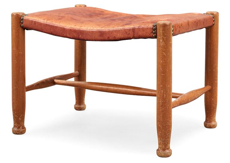 A Josef Frank mahogany and red leather stool, Svenskt Tenn, model 686.