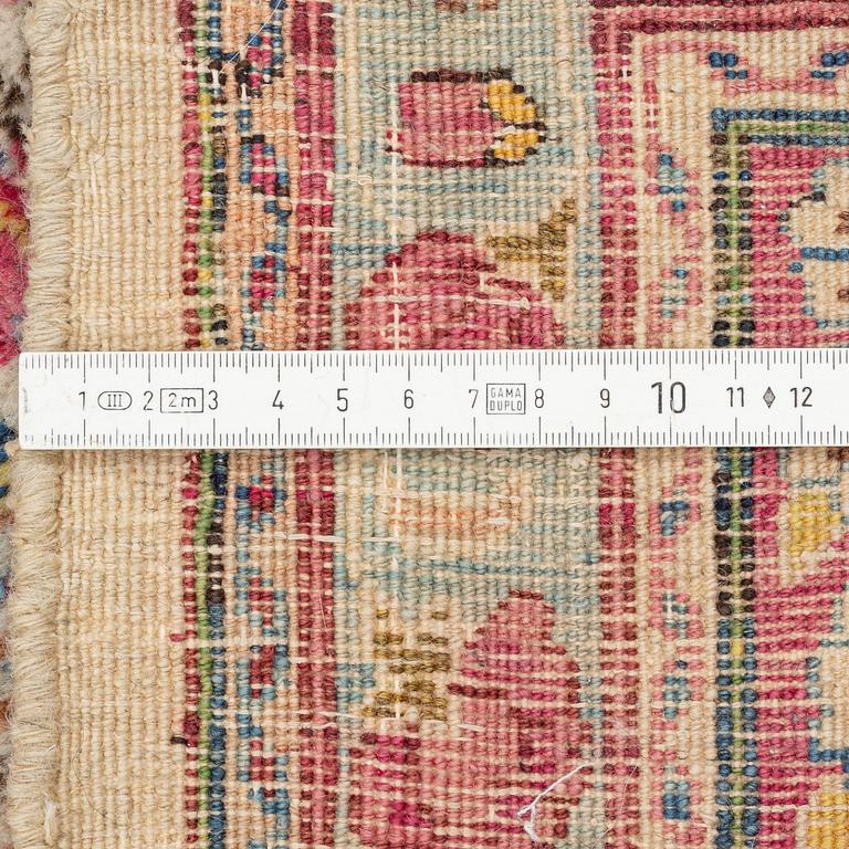A Kirman carpet, old, c. 290 x 212 cm.
