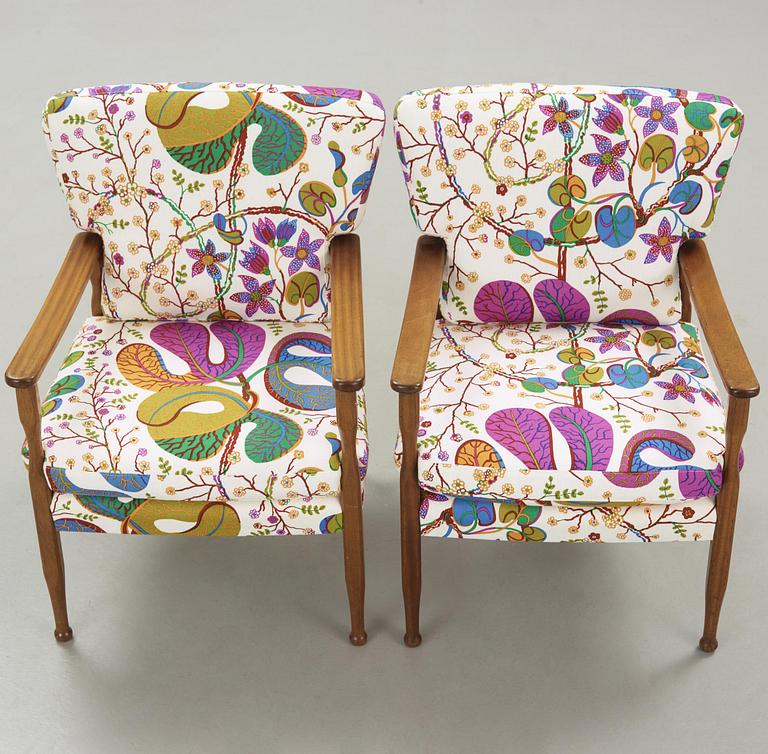 A pair of Josef Frank mahogany armchairs for Svenskt Tenn, model 891.