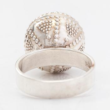 A set of silver "Halikko treasure" necklace, bracelet, ring and earrings. Kalevala Koru, Helsinki 1965-1972.