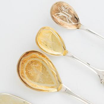 25 parcel-gilt silver cutlery,  1970-78.