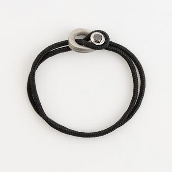 Håkan Orrling, Non Violence, bracelet with black diamond.