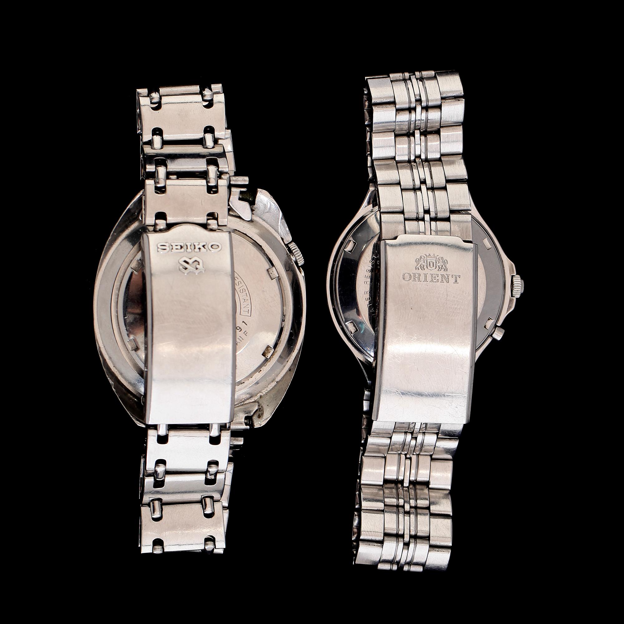 ARMBANDSUR, 2 st, stål, Seiko World Time och Orient.