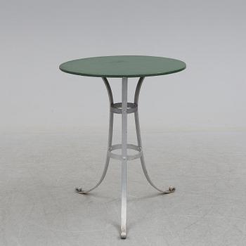 A garden table and four chairs, first half of the 20th century.