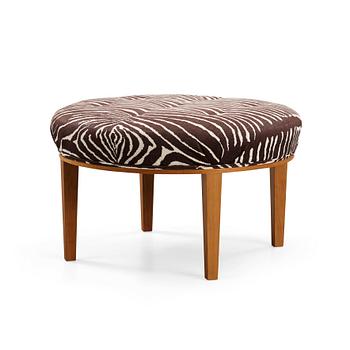 337. A Josef Frank mahogany stool, model 647, by Svenskt Tenn, Sweden.