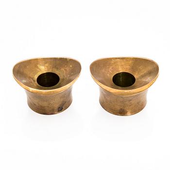 Tapio Wirkkala,  a pair of bronze candle holders for Kultakeskus Oy.