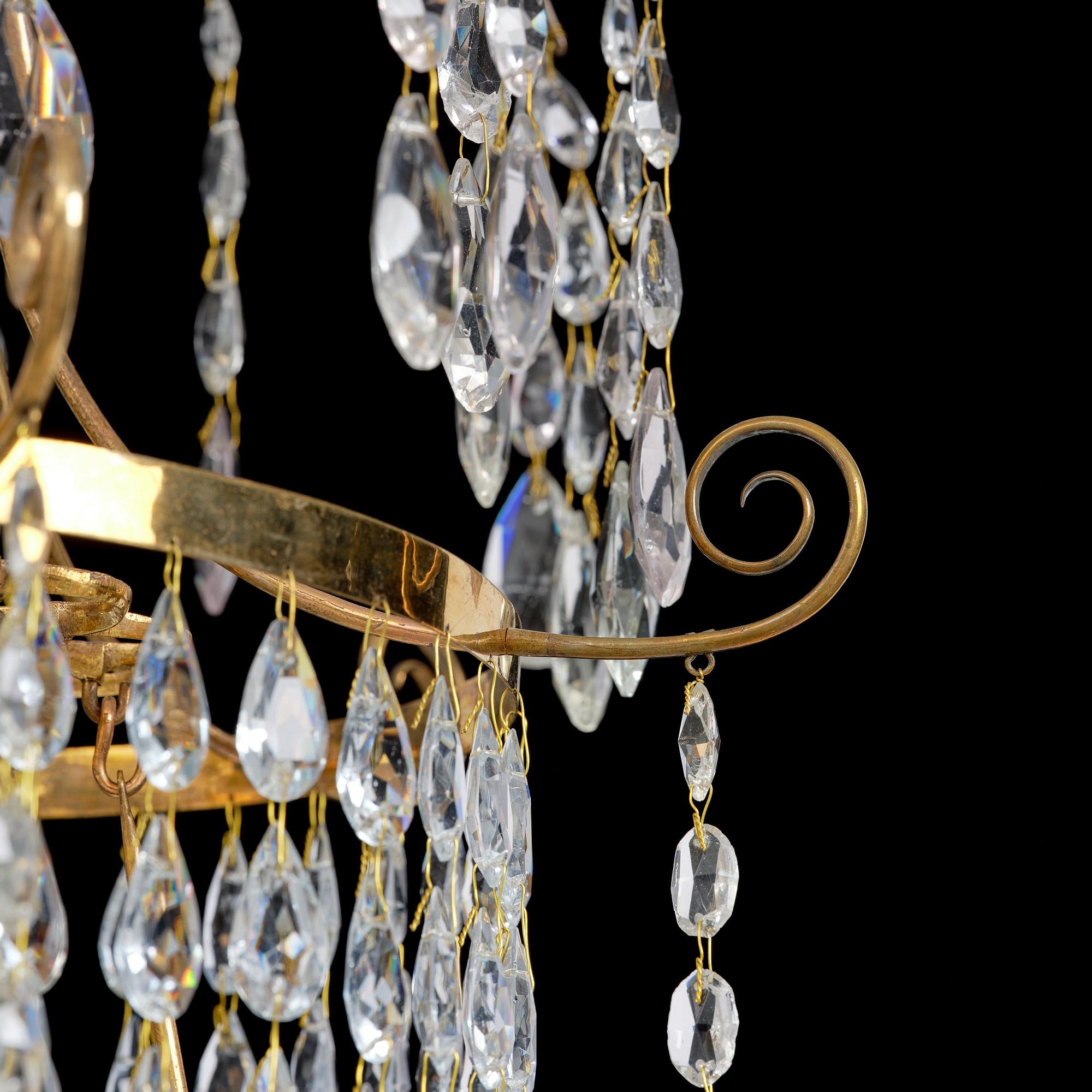 A late Gustavian gilt brass and cut glass seven-light chandelier, Stockholm, late 18th century.