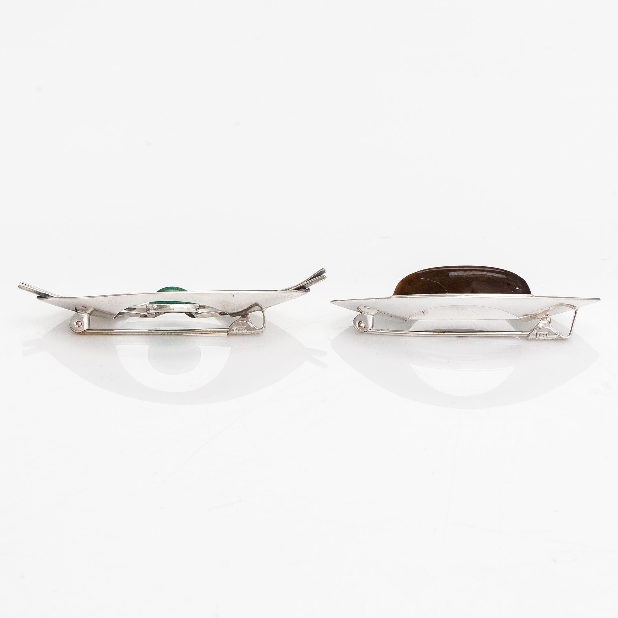 Elis Kauppi, Two silver broocher, with an aventurine quartz and tiger's eye. Kupittaan kulta, Turku 1959 and 1961.