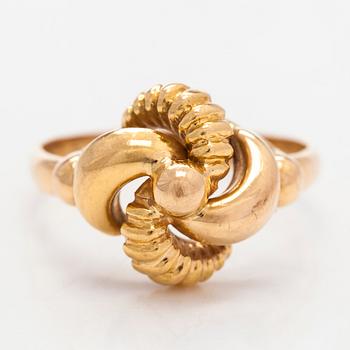 A 14K gold ring.
