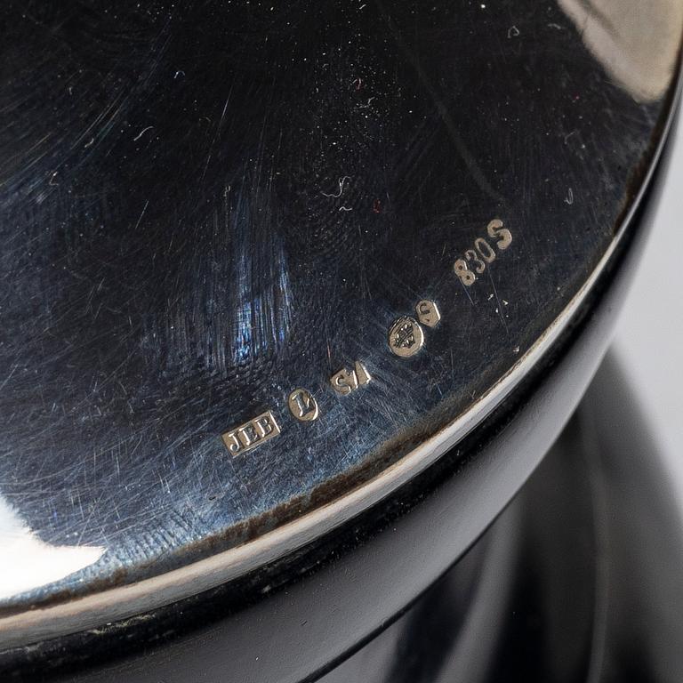 A cup and two plates, silver, second half of the 20th century.