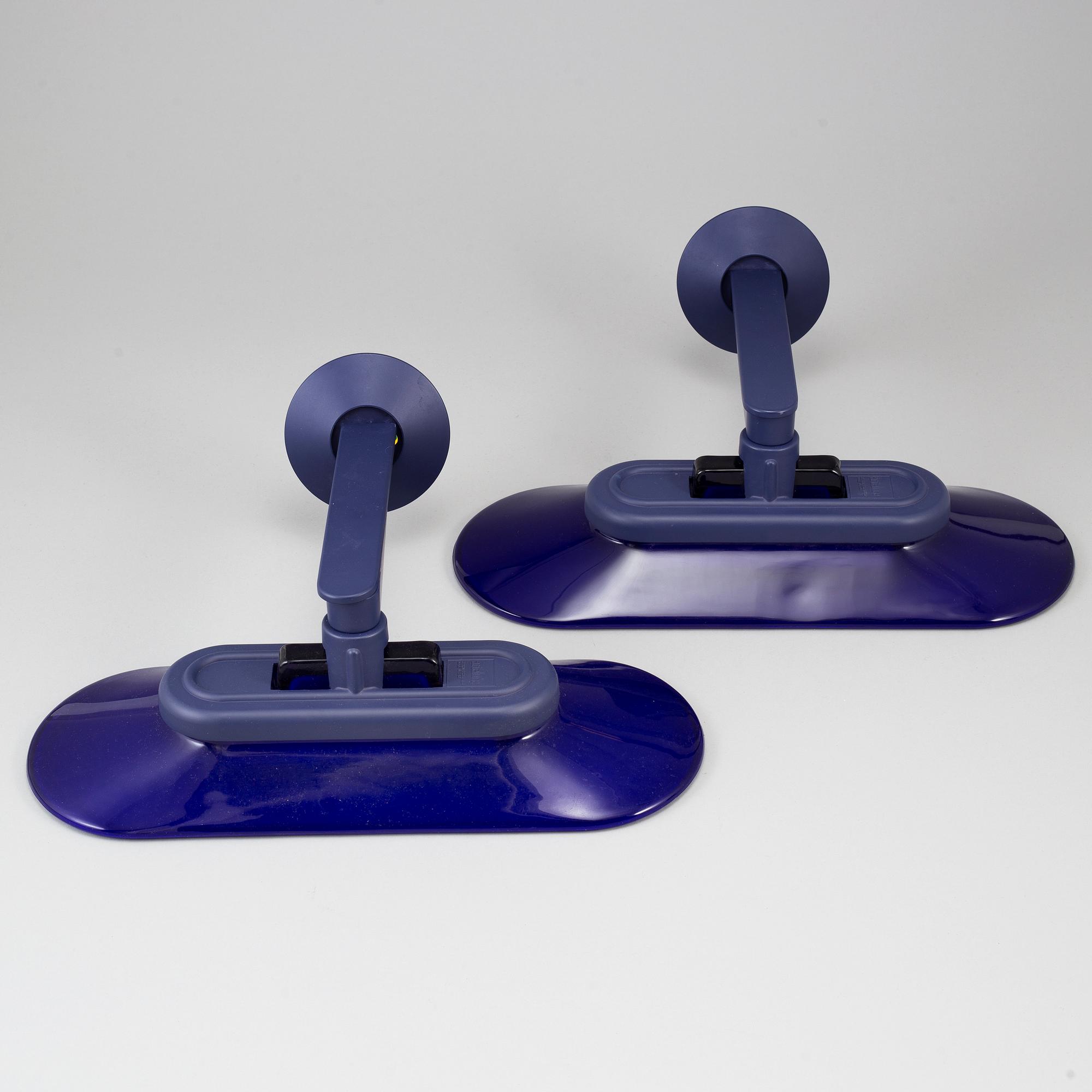 A pair of Arteluce wall lights.