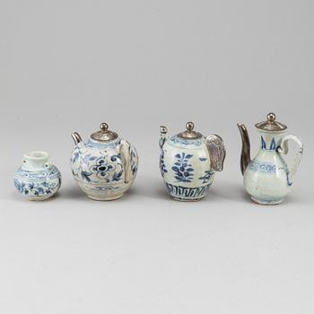 A group of south east asian teapots and a jar, 16th/17th Century.