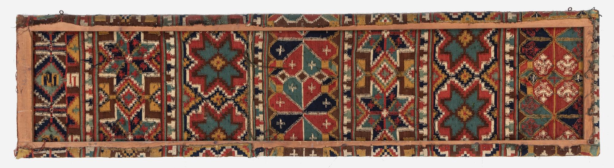 A flat weave 'Rosettes', Bench cushion c. 205 x 50 cm, Southwestern Scania, Sweden, first half of the 19th century.