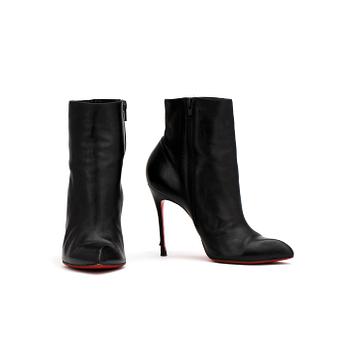 603. CHRISTIAN LOUBOUTIN, a pair of black leather boots. Size 37,5.