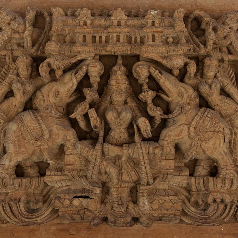 A carved wooden panel, India, circa 1900.