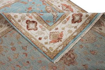 An oriental carpet with Mamluk-design, c. 303 x 239 cm.