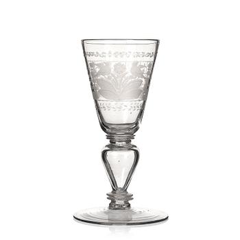 403. A German engraved glass goblet, 18th Century.