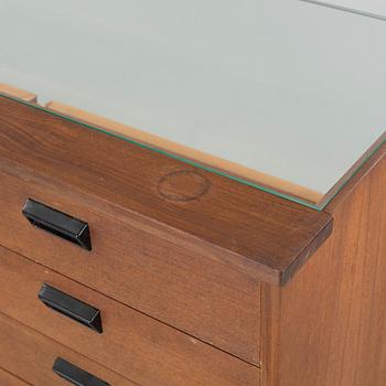 A circa mid 20th century store counter.