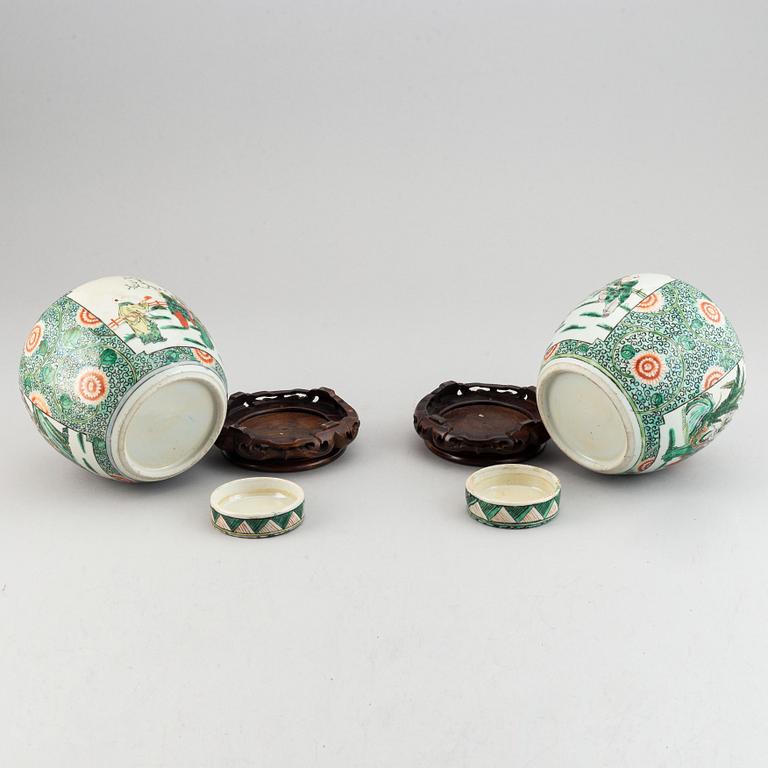 A pair of Chinese famille verte jars with covers, 20th century,