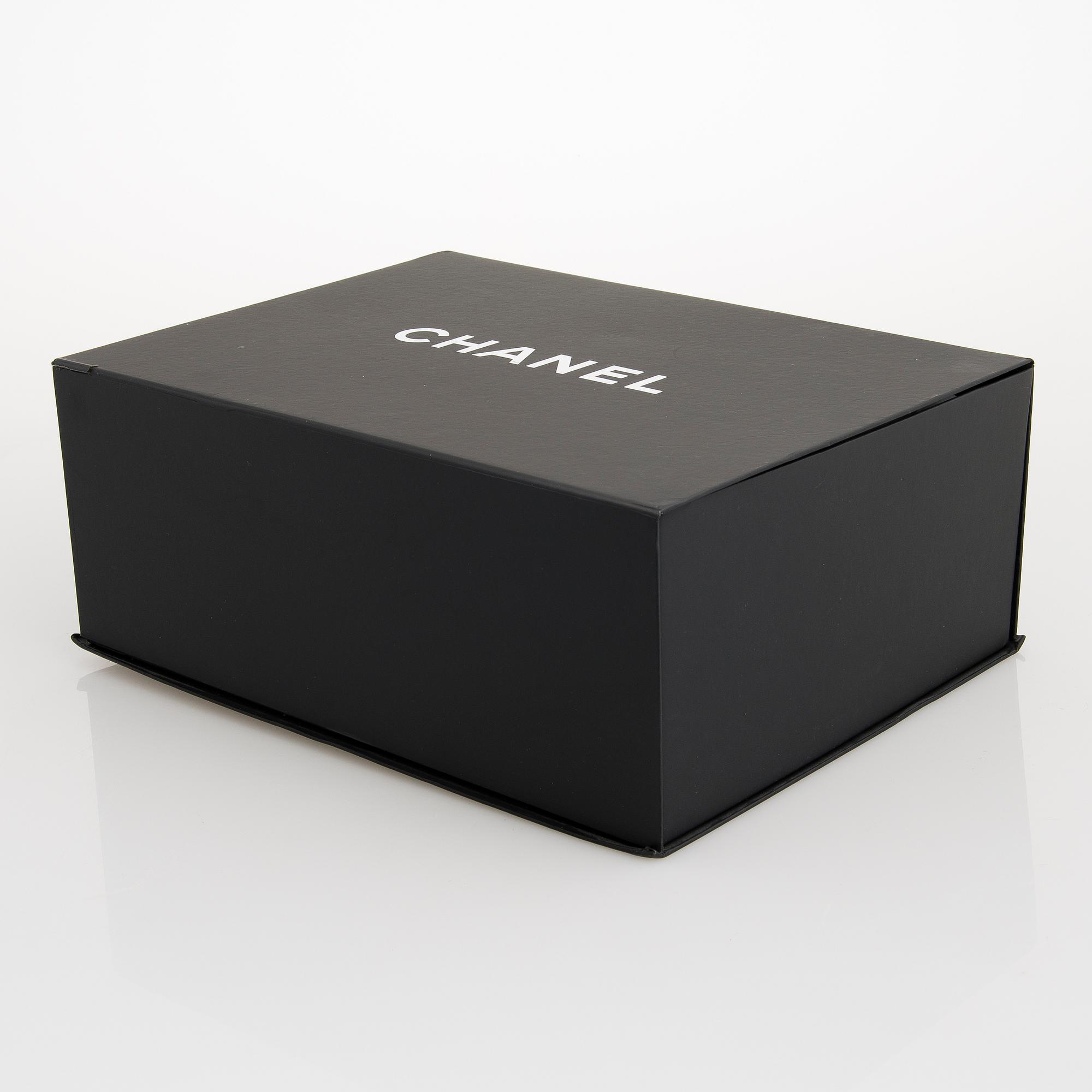 CHANEL, A Large Black Leather Shopping Bag.