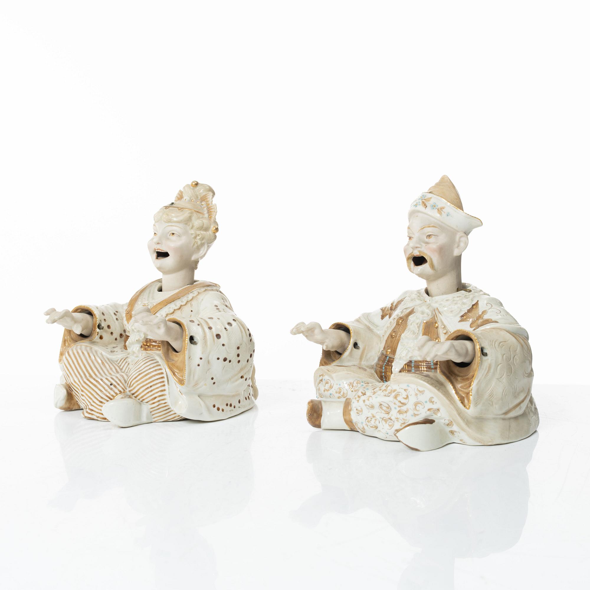 A pair of porcelain nodding head figures, Germany, 1920/30s.