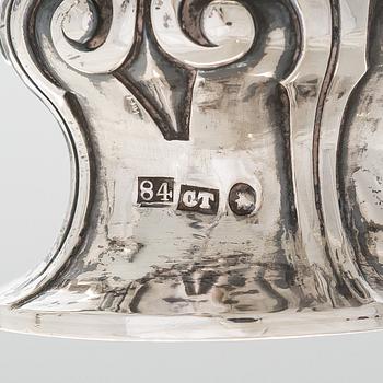 A pair of silver candelabra, maker marks of Carl Johan Tegelsten, Saint Petersburg 1850.
