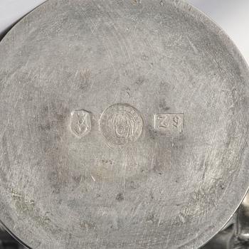 Anna Petrus, a pewter vase, 'Janushuvud', Firma Svenskt Tenn, Stockholm, 1974.