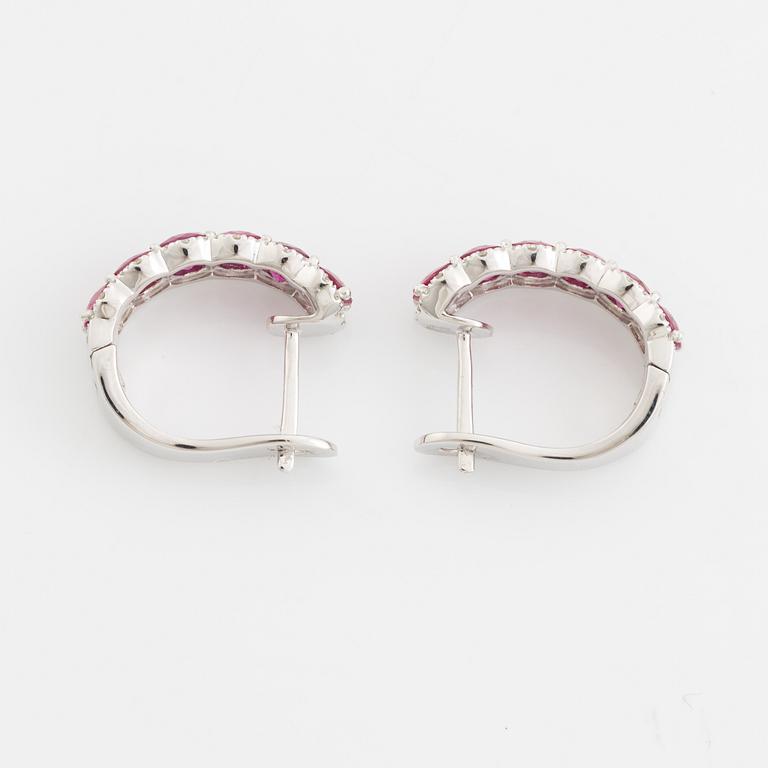 Earrings with rubies and brilliant-cut diamonds.