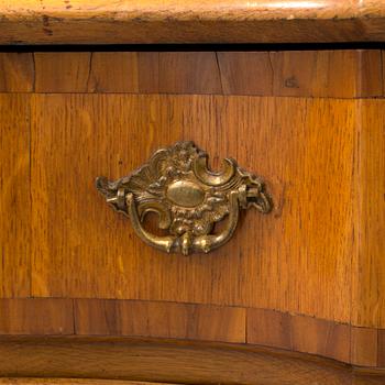 A late baroque chest of drawers.